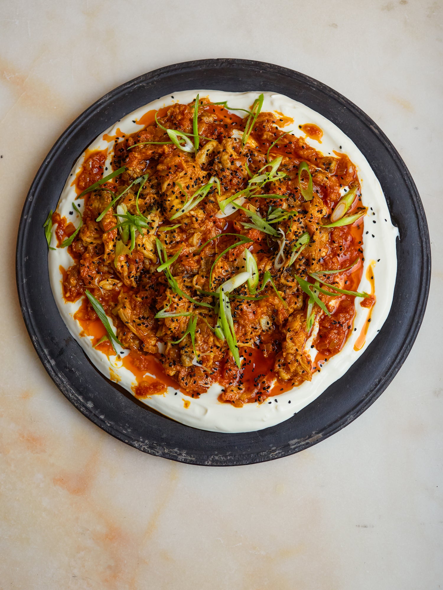 Burnt aubergine pickle with garlic yoghurt