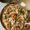Celebration rice with lamb, chicken and garlic yoghurt