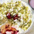Cherry trifle with pistachio and rosemary crumble