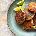 Chorizo, banana and prawn cakes with harissa yoghurt