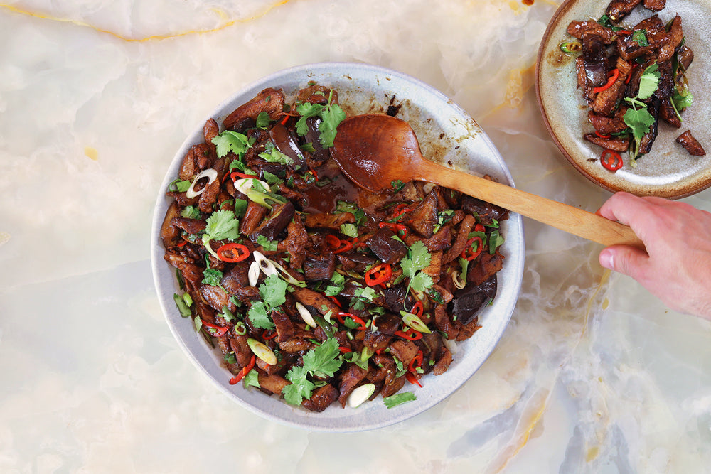 Crispy cumin lamb with aubergine & ginger