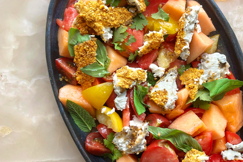 Dukkah crusted feta with heritage tomatoes and melon salad