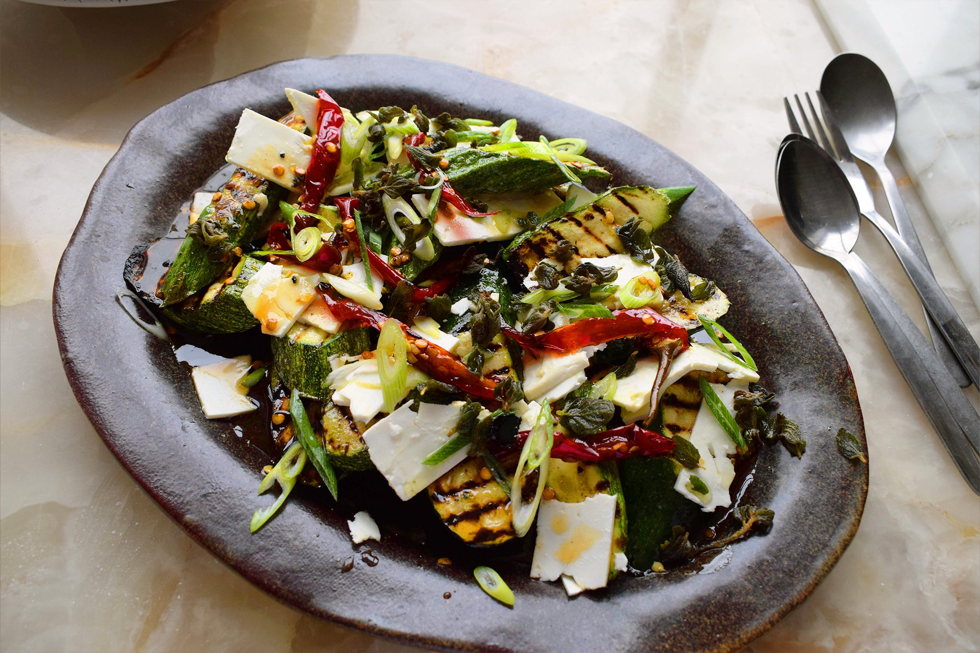 Grilled courgettes with cascabel honey