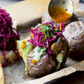Jacket potatoes with aubergine and green tahini