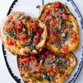 Olive oil flatbreads with three-garlic butter
