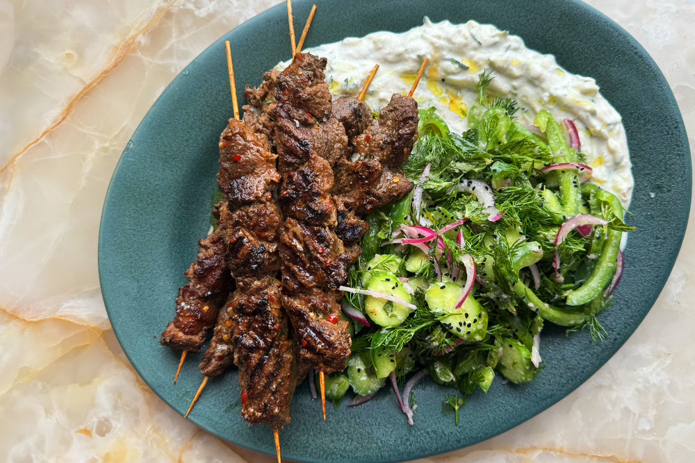 Pork souvlaki with cucumber salad and tzatziki
