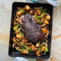 Roast lamb shoulder with potatoes and fennel