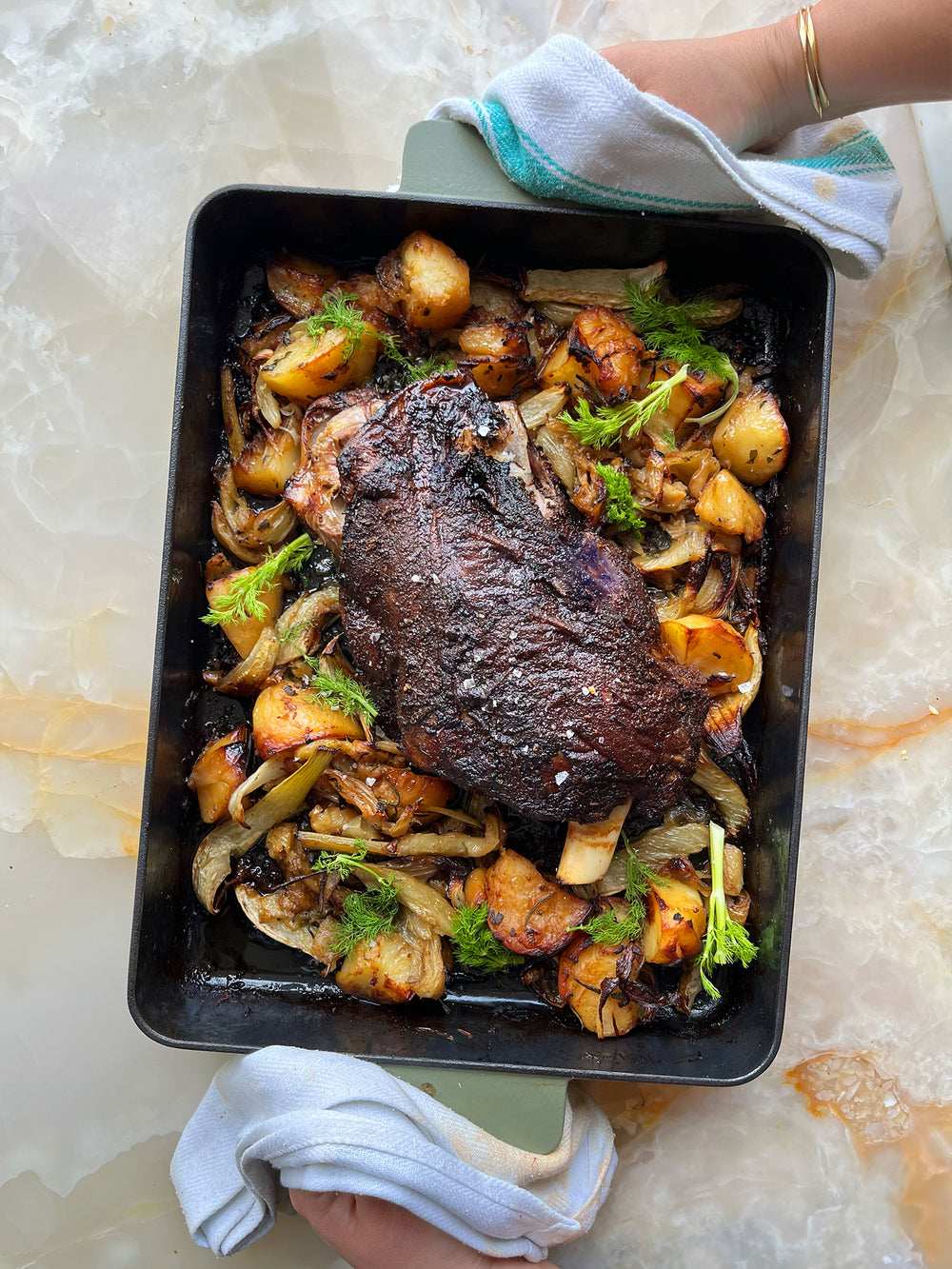 Roast lamb shoulder with potatoes and fennel-image
