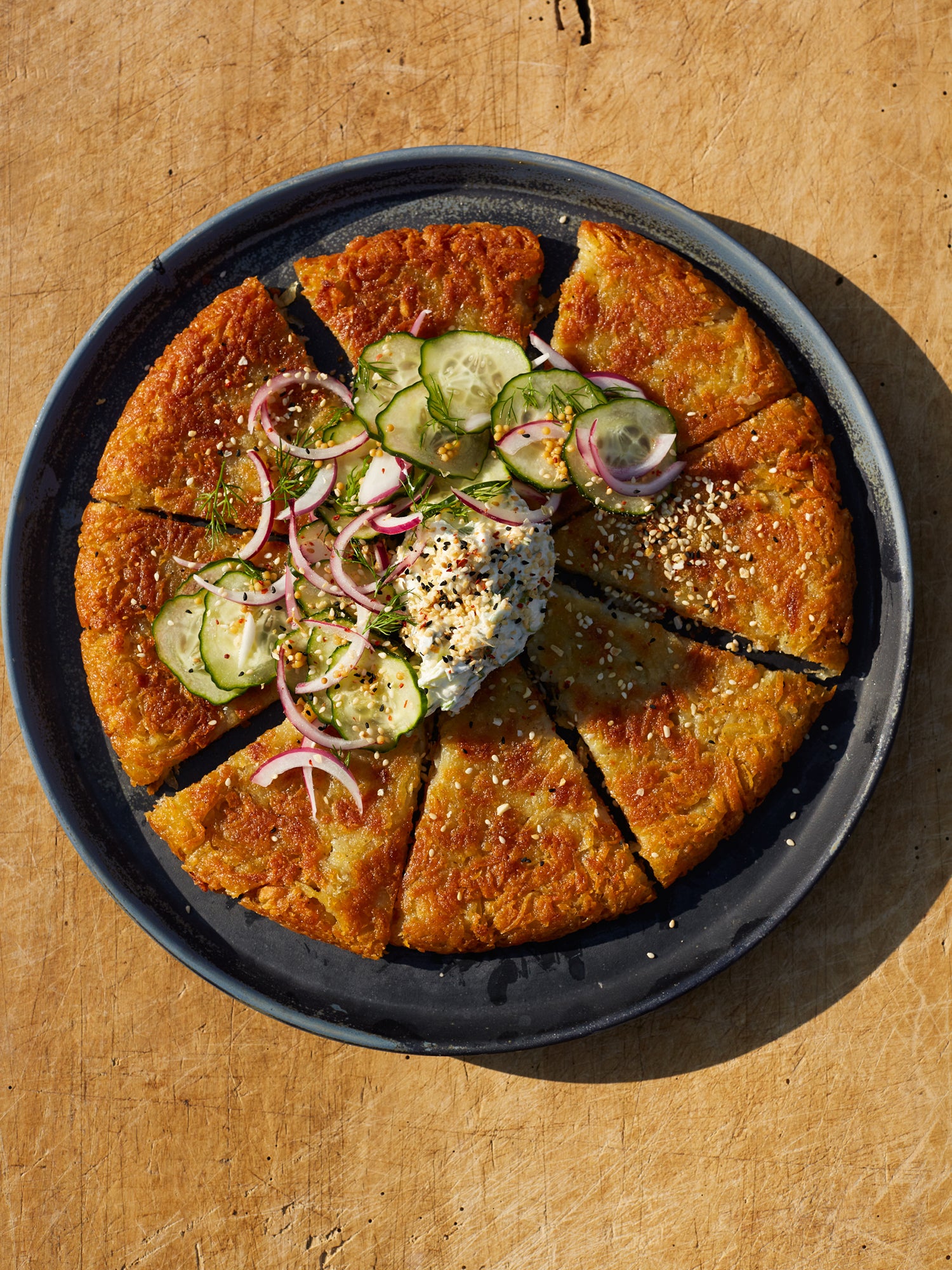 Rösti with cream cheese, dill pickle and everything seasoning