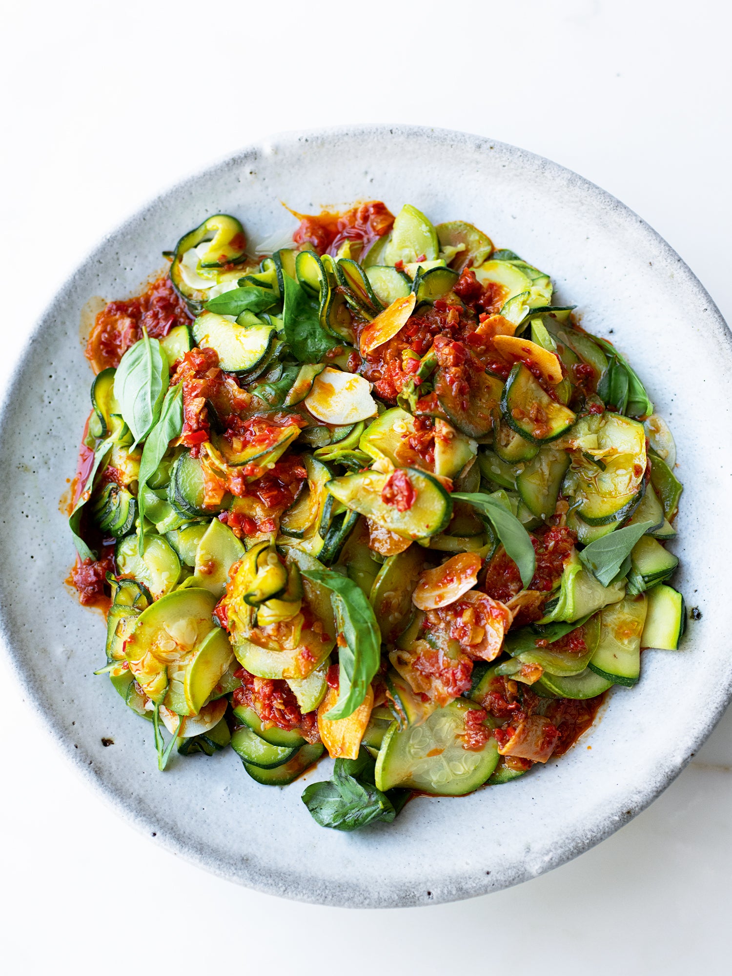 Super-soft courgettes with harissa and lemon