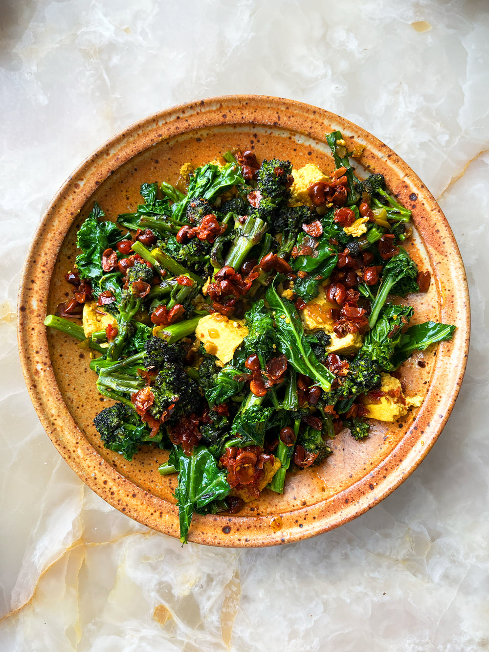 Tofu with purple sprouting broccoli and spicy peanut oil