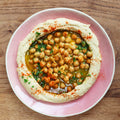Warm chickpeas and garlic hummus topping