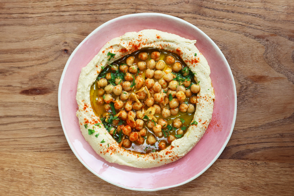 Warm chickpeas and garlic hummus topping