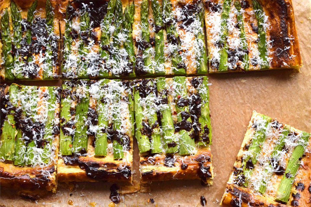 Asparagus and ricotta tart with miso and black garlic