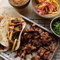 BBQ lamb tacos with pineapple pickle and chutney
