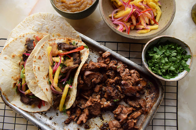 BBQ lamb tacos with pineapple pickle and chutney