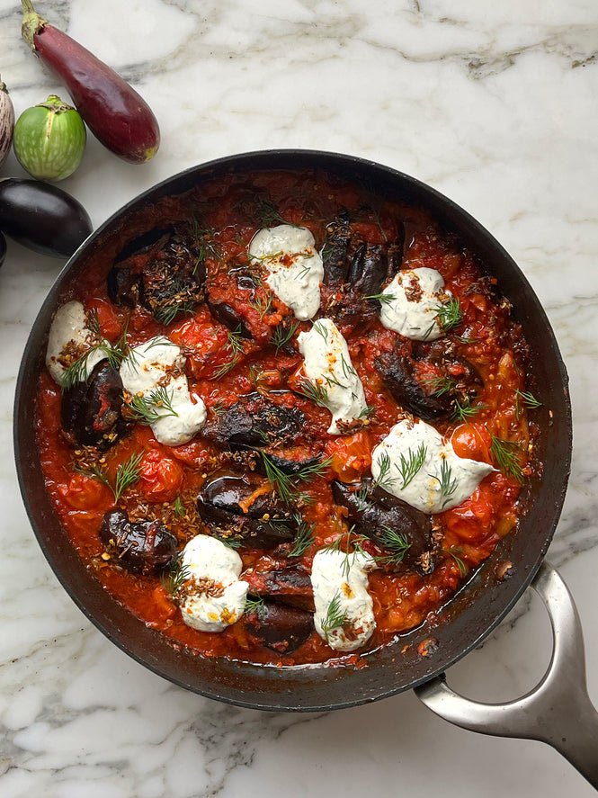 Baby aubergines in tomato sauce with anchovy and dill yoghurt