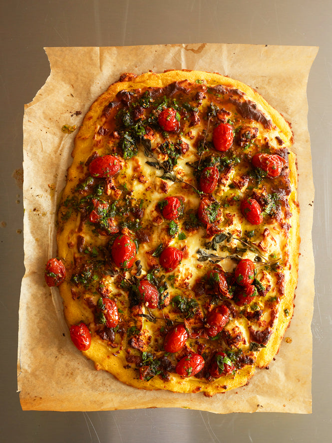 Baked polenta with feta, béchamel and za'atar tomatoes