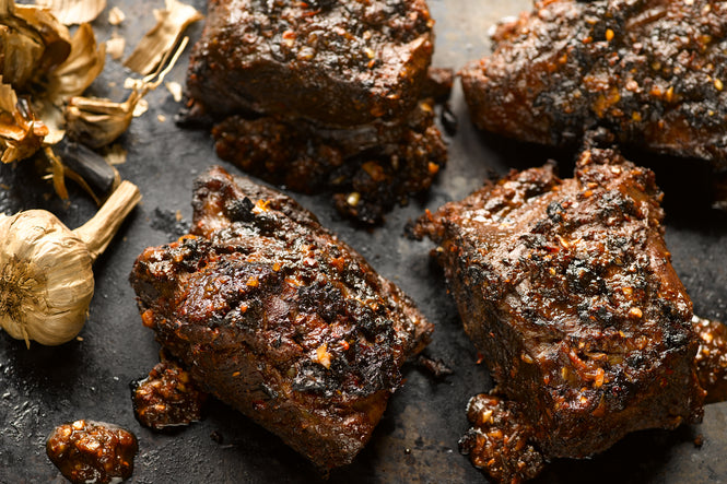 Barbecue beef short ribs with black garlic and urfa chilli