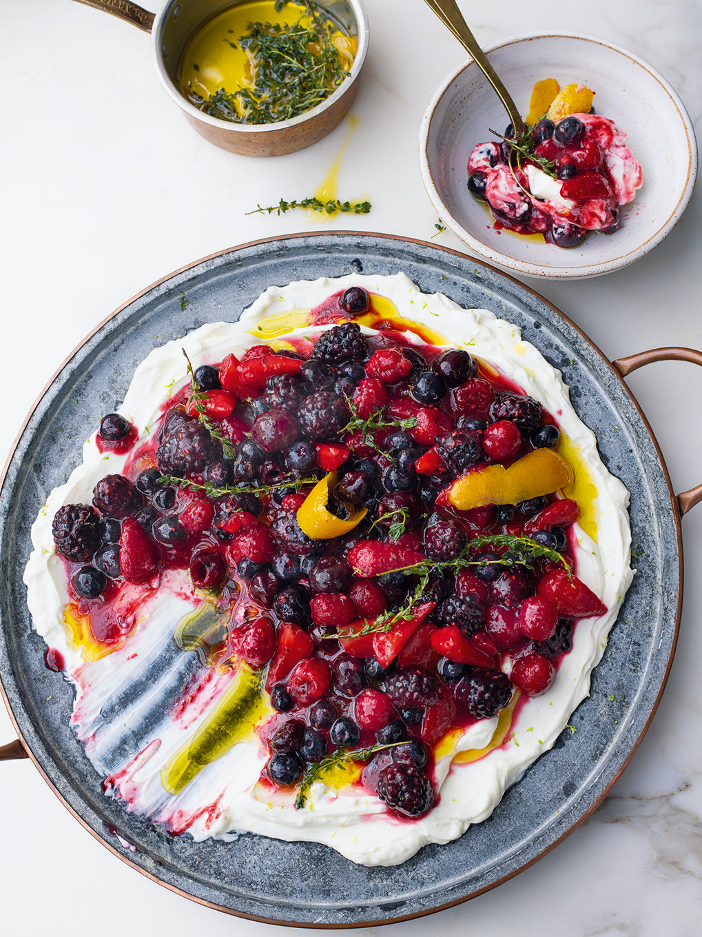 Berry platter with sheep’s labneh and orange oil