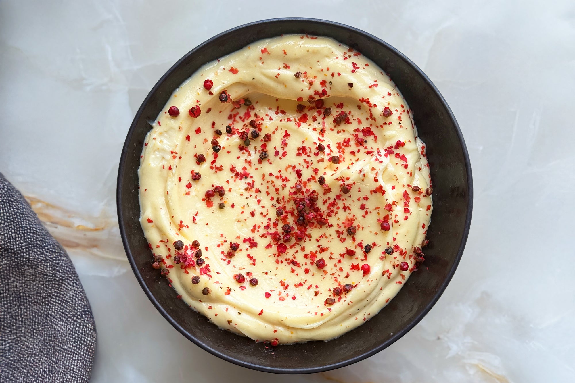 Artichokes with pink peppercorn aïoli and anchovy butter | Ottolenghi