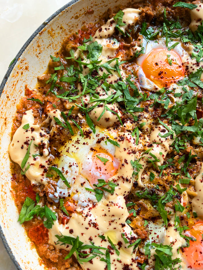 Braised eggs with beef, smoked aubergine and tomato
