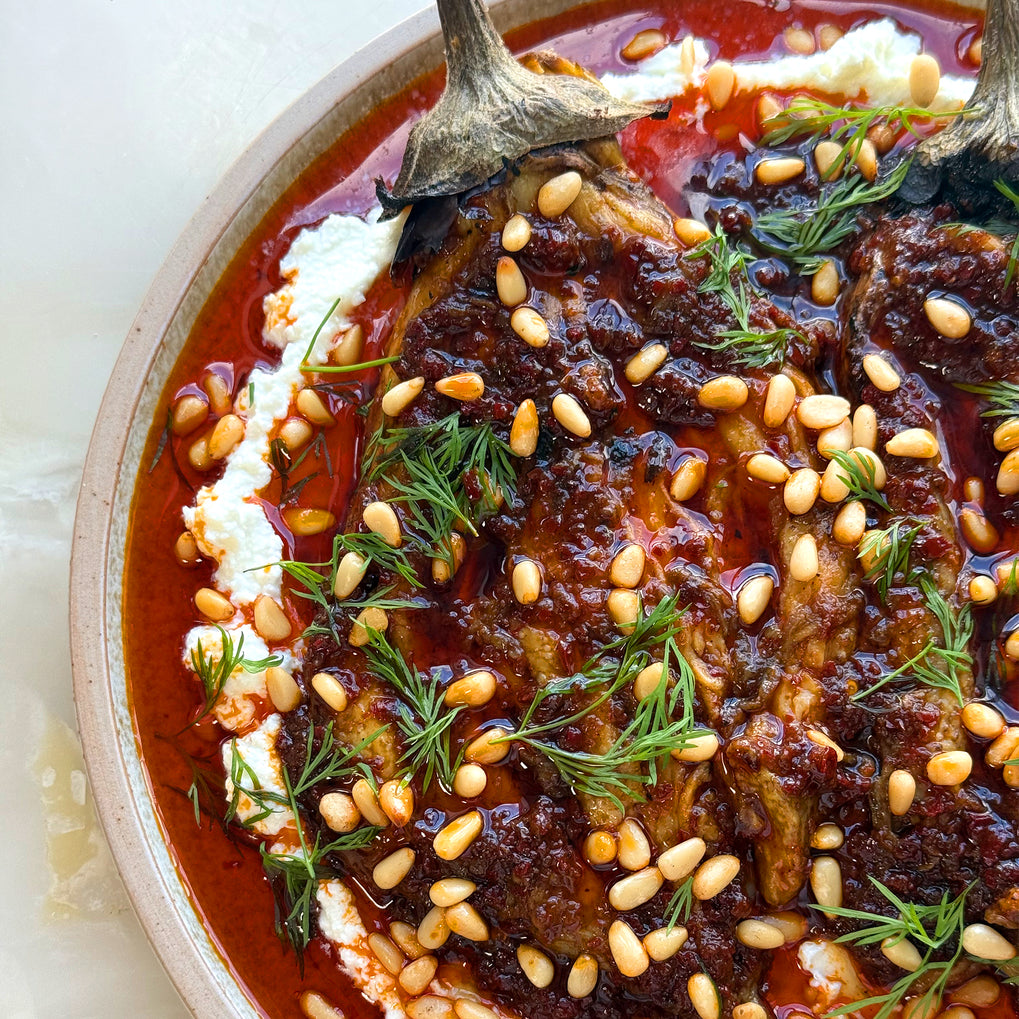 Burnt aubergine with feta and harissa oil