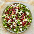 Charred sugar snap, pomegranate and couscous salad