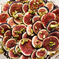 Cinnamon pavlova, praline cream and fresh figs
