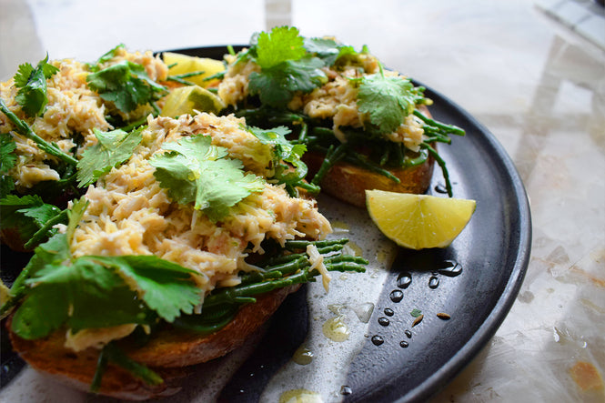 Crab on toast with lime, cumin and samphire