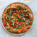 Curried carrot mash with brown butter and quick-pickled chillies