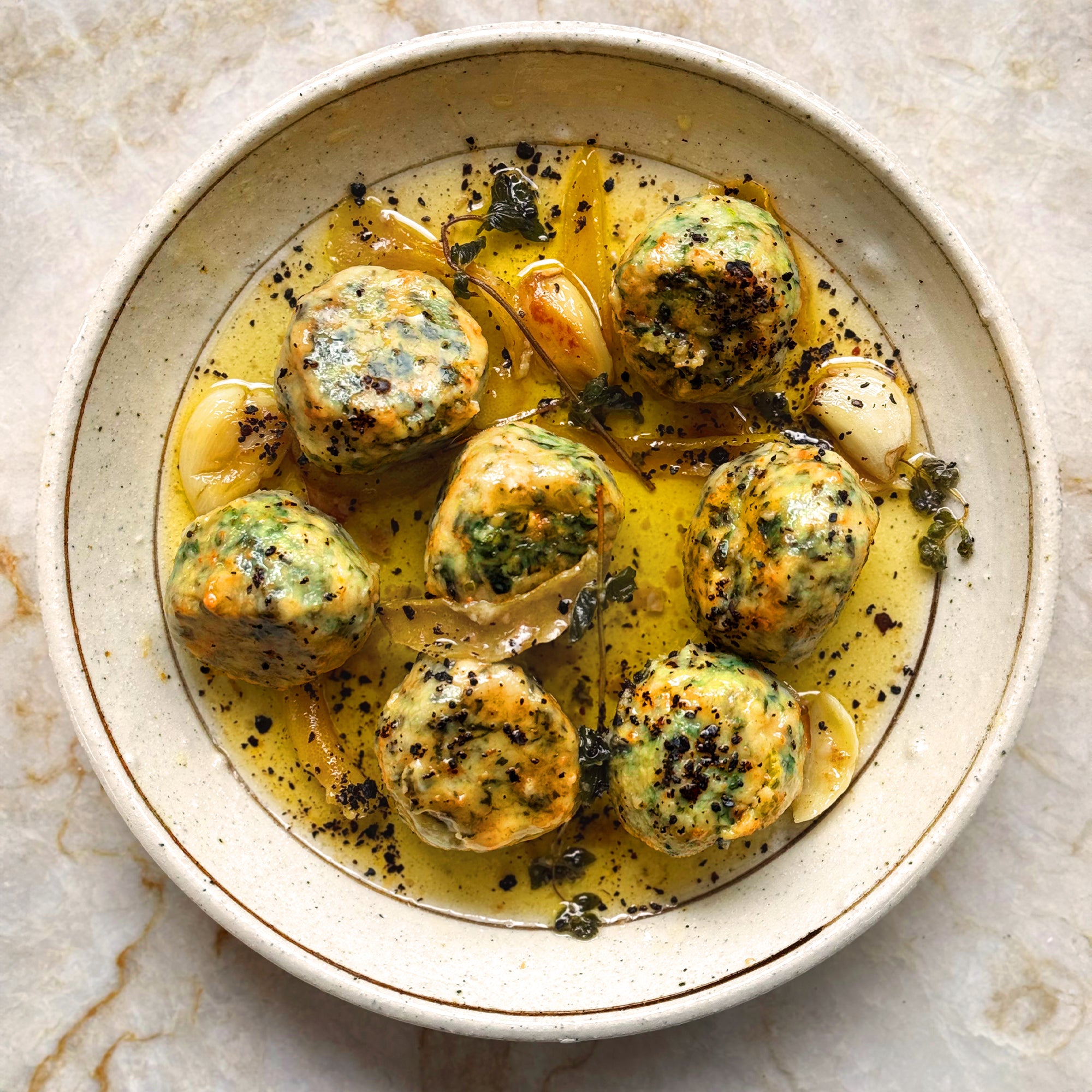 Spinach and feta dumplings in lemon butter