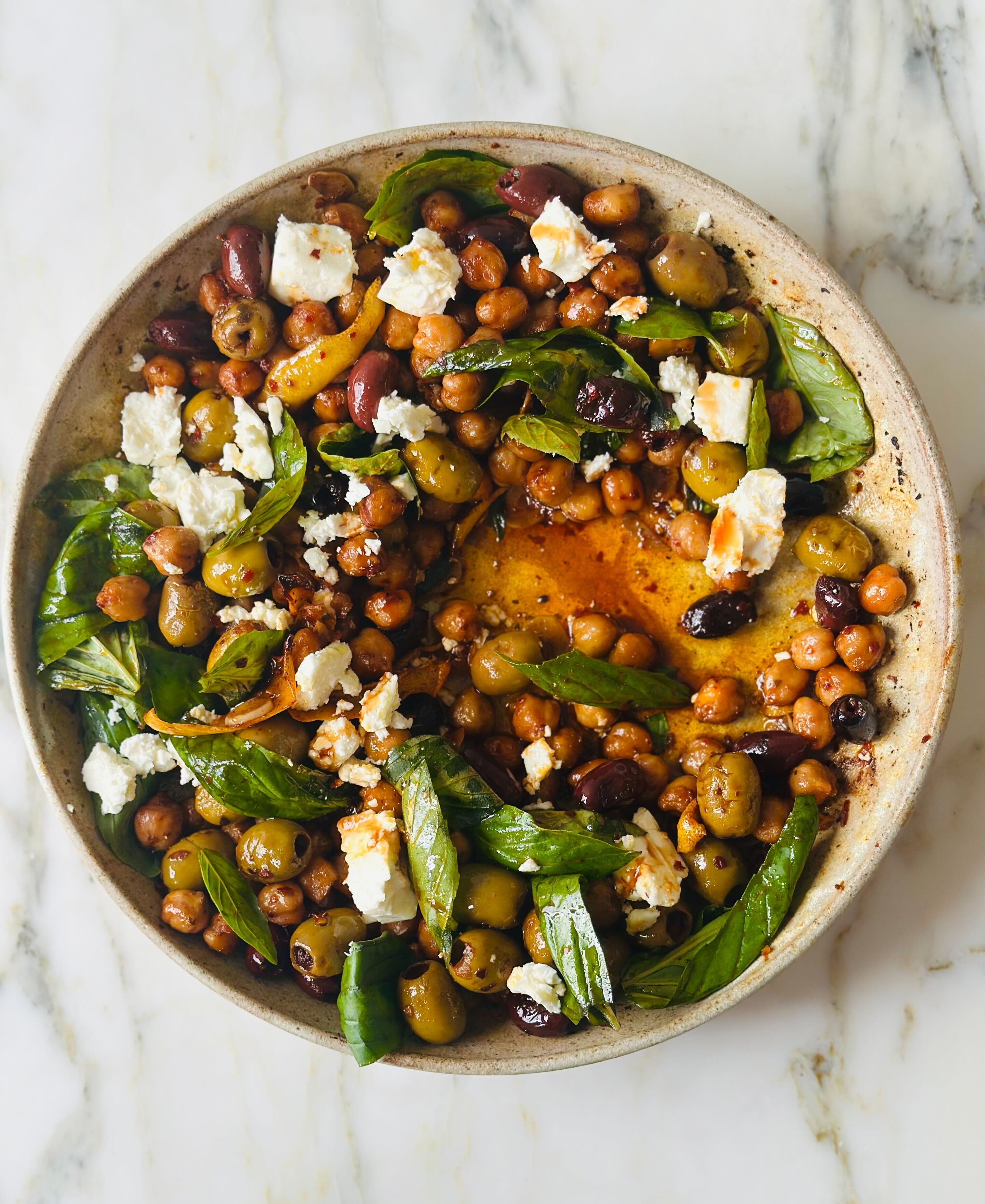 Pomegranate harissa olives and chickpeas with feta