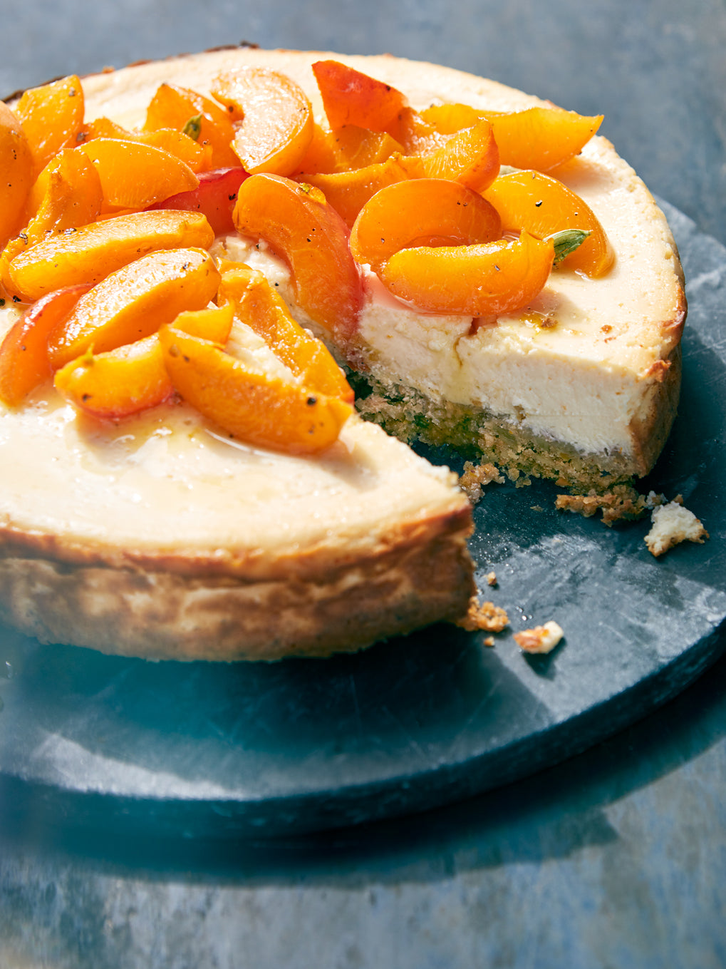 Labneh cheesecake with roasted apricots, honey and cardamom