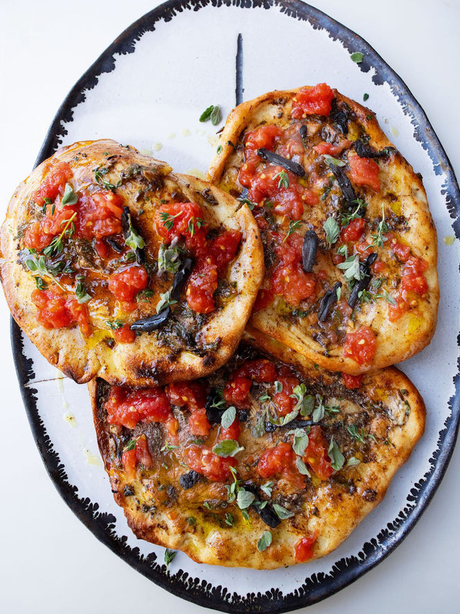 Olive oil flatbreads with three-garlic butter
