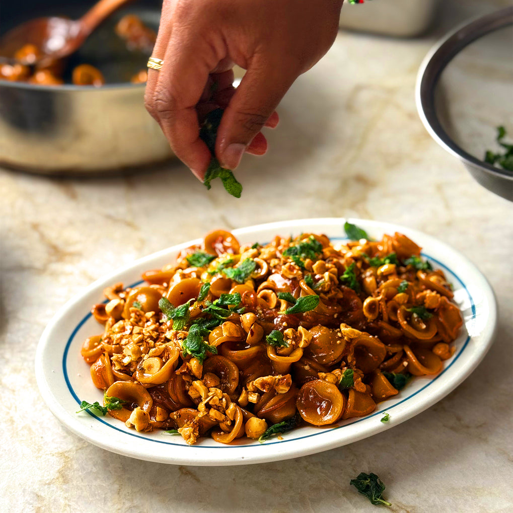 Caramelised onion orecchiette with hazelnuts and sage