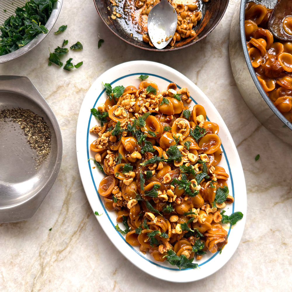 Caramelised onion orecchiette with hazelnuts and sage