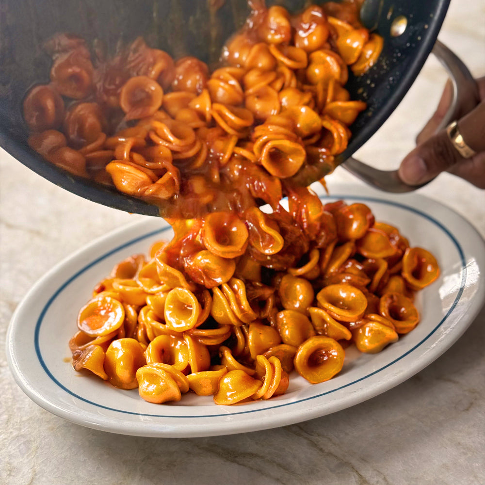 Caramelised onion orecchiette with hazelnuts and sage