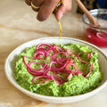 Pea and artichoke dip with pickled onions