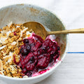 Pecan and coconut granola with roasted rhubarb and blackcurrants