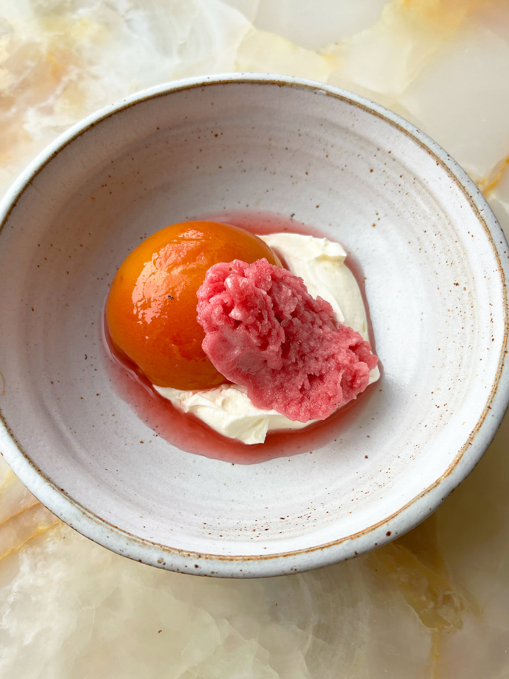 Poached peaches with rosé granita