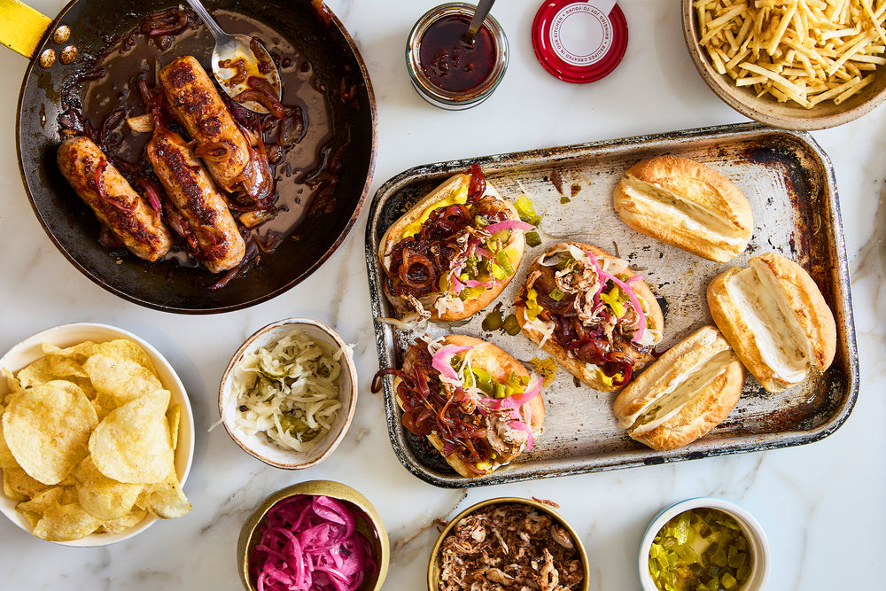 Pomegranate & lemon harissa sticky sausages Recipe Image