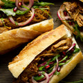 Pulled pork sandwich with pomegranate salad