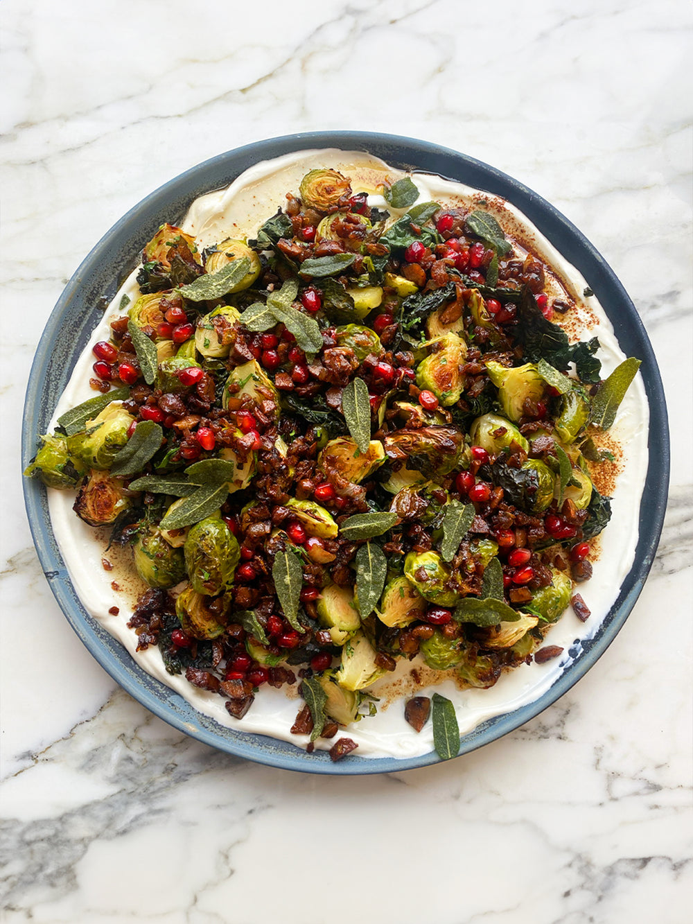 Roasted Brussels sprouts with cinnamon-butter yoghurt and chestnuts