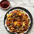 Roasted and raw courgettes with tomato salsa and labneh