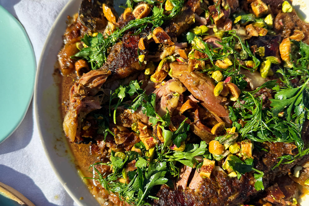 Slow-cooked lamb shoulder with fig and pistachio salsa