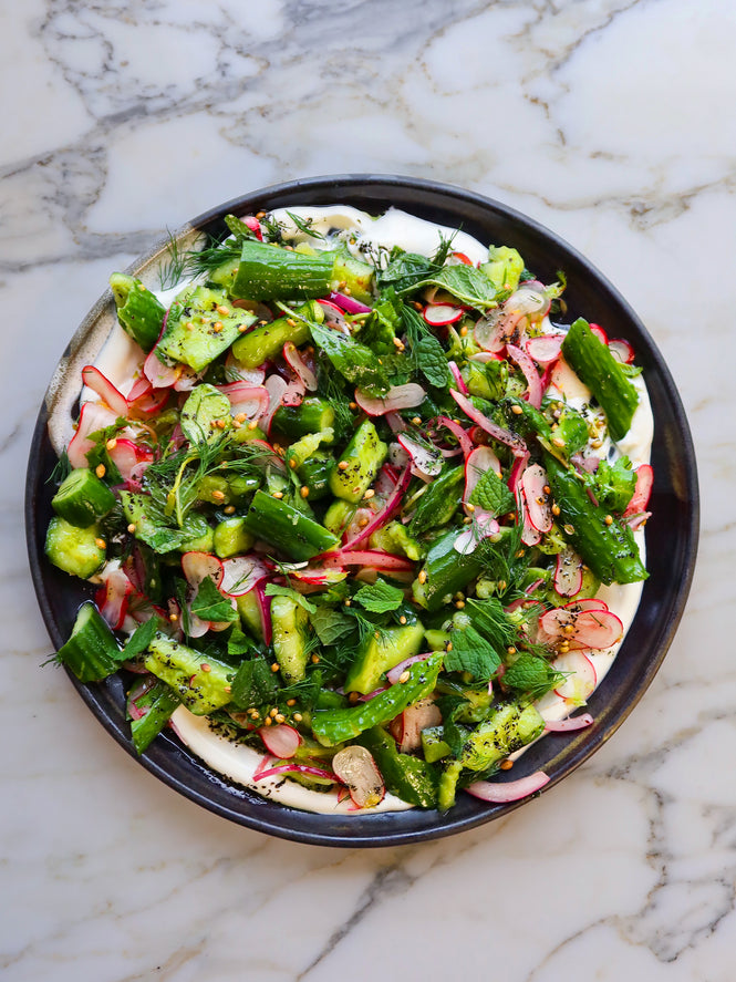 Smacked cucumber salad with sumac onions and radishes 