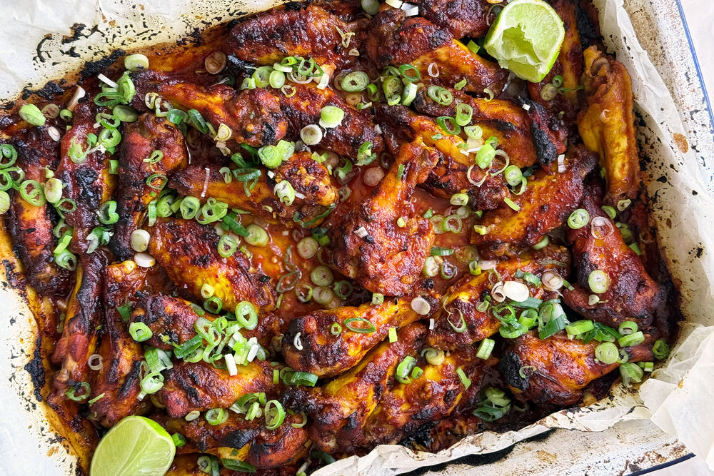 Sweet and smokey chicken wings with spring onions and lime Recipe Image