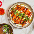 Spicy sweet potatoes with spring onion and pumpkin seed salsa