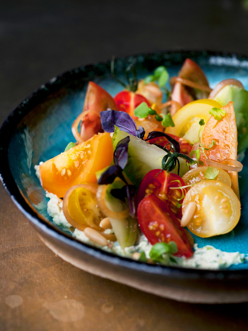 Tomatoes with wasabi mascarpone and pine nuts